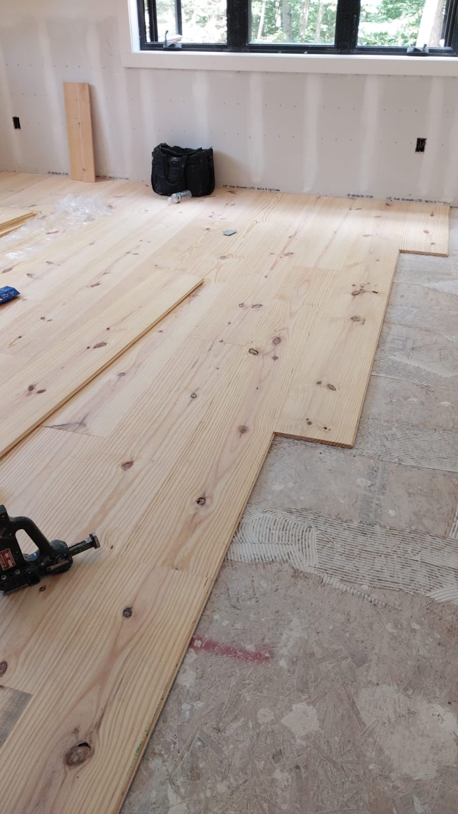Hardwood floor installation in progress