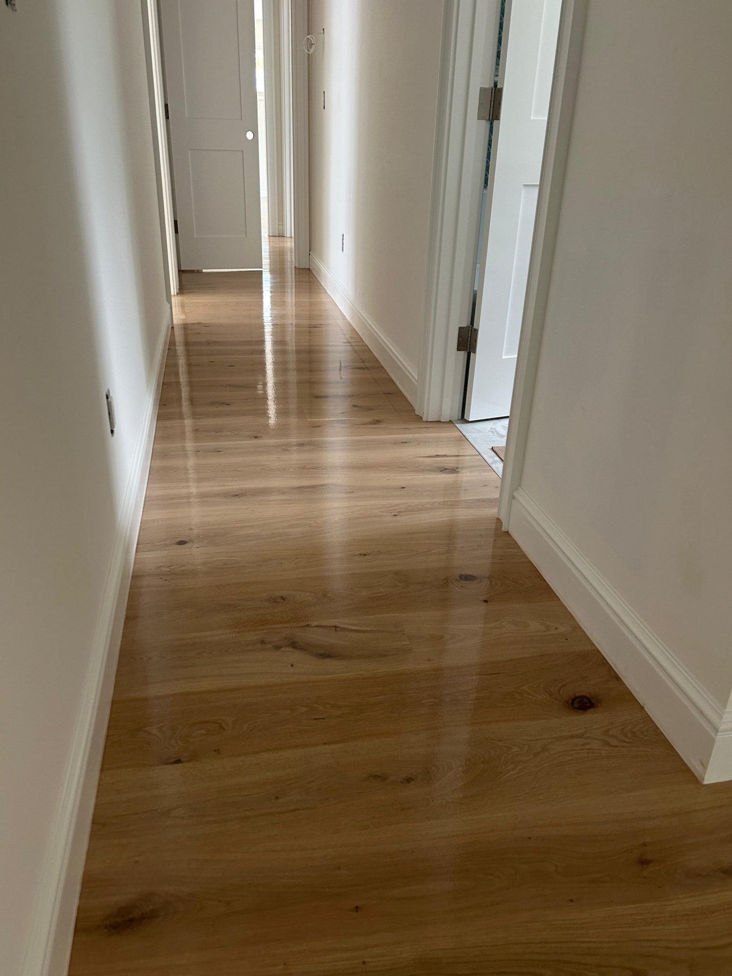 Hallway hardwood floor refinish natural finish