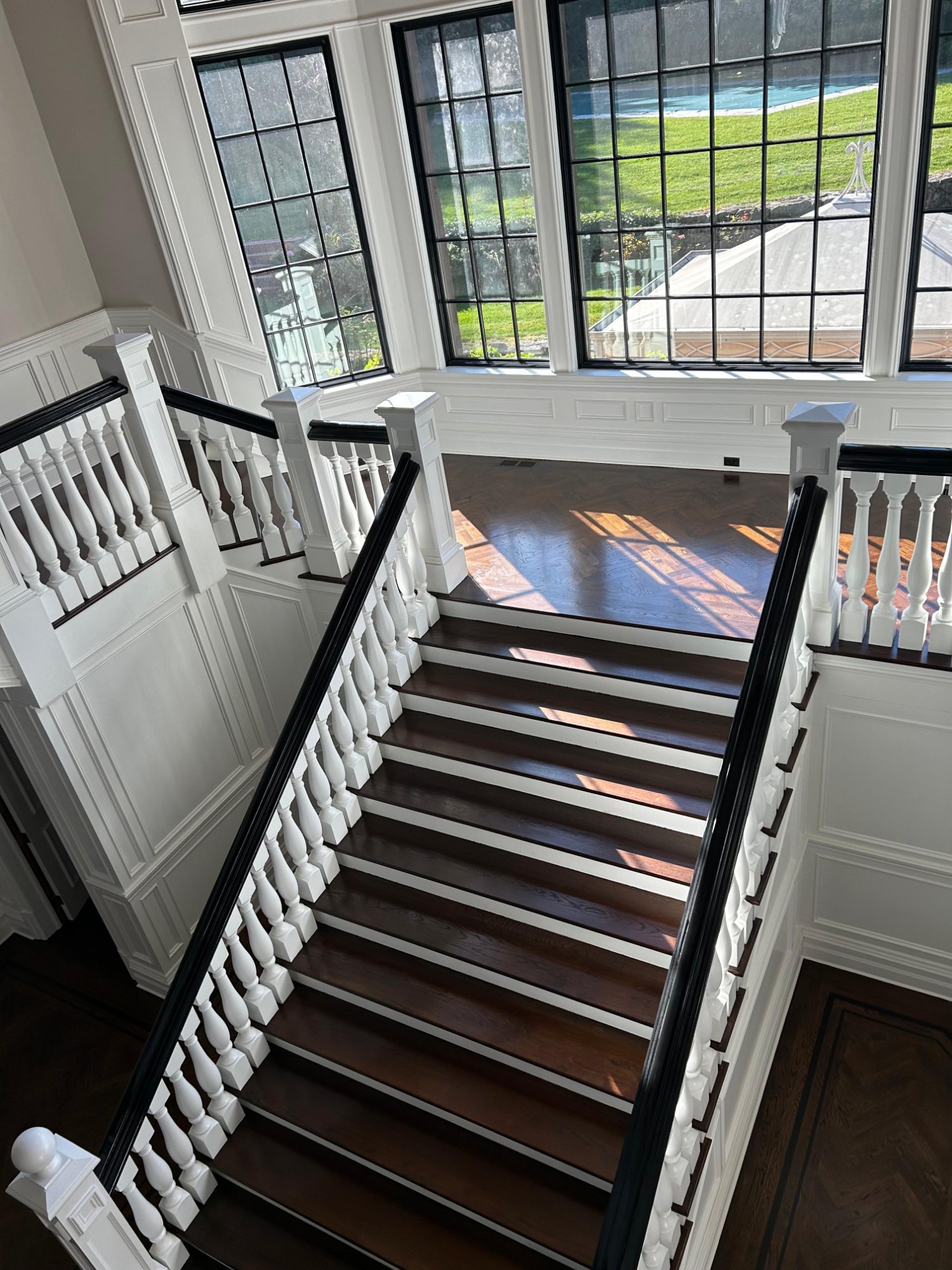 Staircase refinish overhead view dark walnut